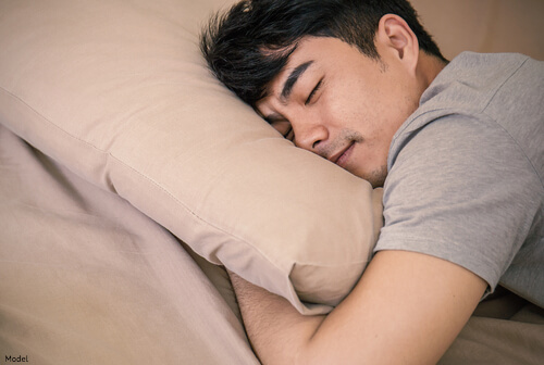 Man sleeping on a pillow