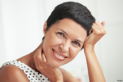 Woman smiling with a rejuvenated face