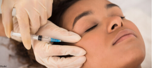 Woman getting an injectable treatment